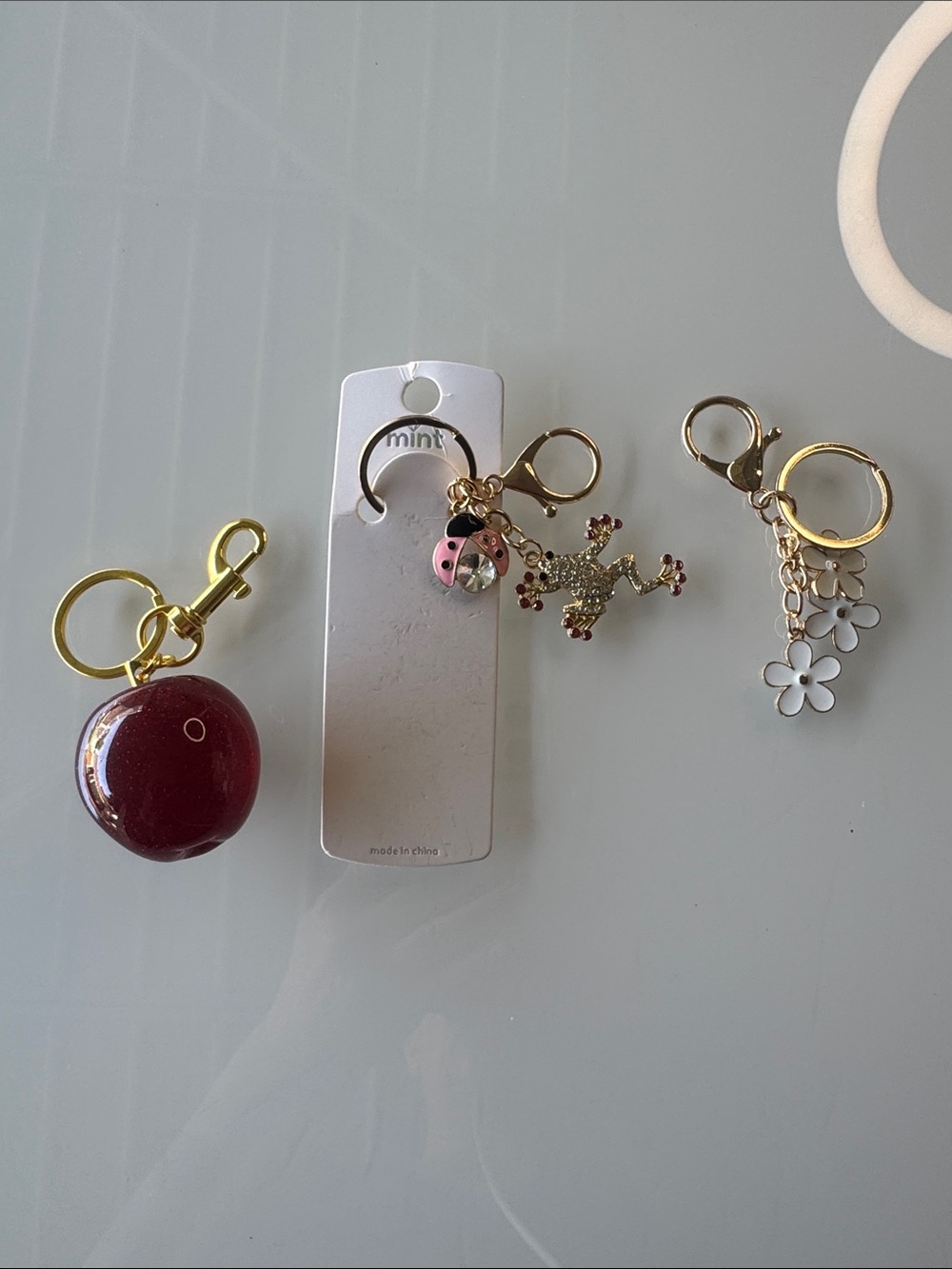 Gold Keyring Charms bulk lot with Red Apple, Ladybug & frog. And Flower charms